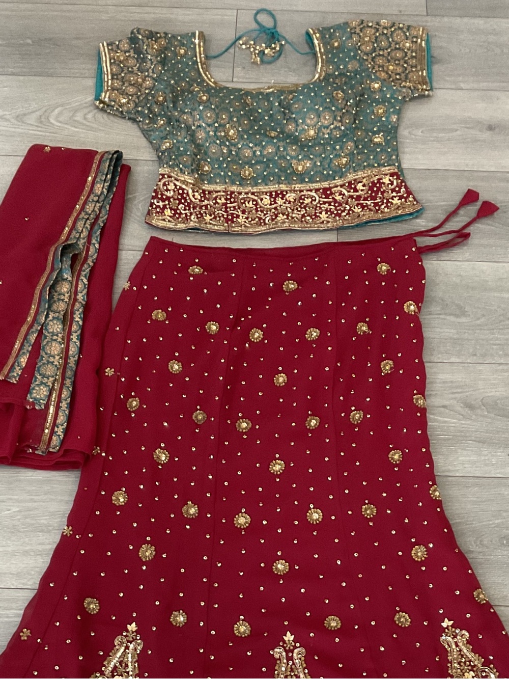 Traditional Red and Teal Embellished woman Lehenga blouse